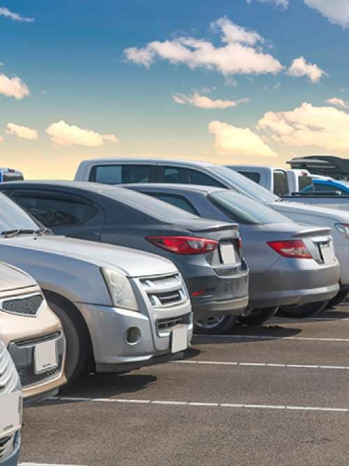 Car parking in large asphalt parking lot with white cloud and blue sky background. Outdoor parking lot with fresh ozone and green environment of transportation and modern technology concept
; Shutterstock ID 1690102105; Invoice Number: -