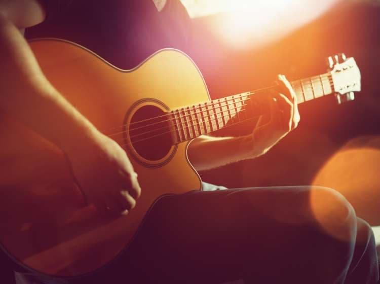 Practicing acoustic guitar
