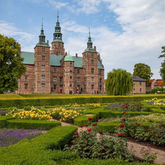 Rosenborg castle, Copenhagen. Sunny summer day view. Blooming terraces at the foreground.; Shutterstock ID 612301205; purchase_order: n/a; job: Baltics guide; client: cunard_digital; other: As per pre-arranged agreement