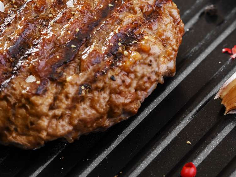 Burger cooking from Poolside Grill on-board