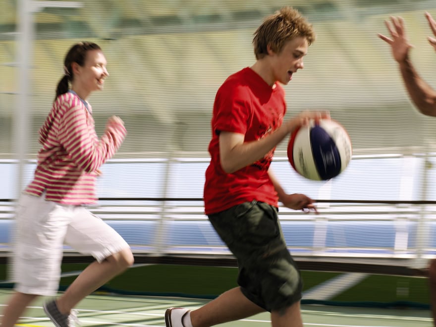 People playing basketball on ship