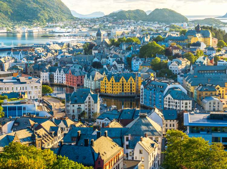 Sunset over Brosundet Canal and Art Nouveau buildings, Alesund, More og Romsdal county, Norway