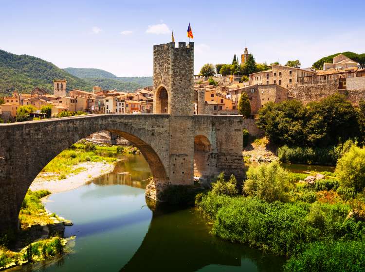 Medieval bridge with antique gate, built in the 12th century. Besalu, Catalonia