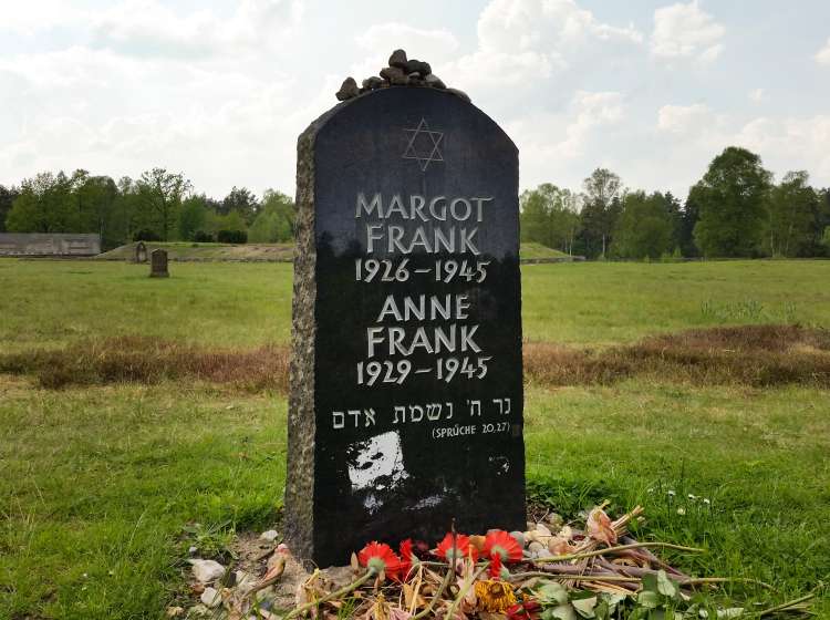 Bergen-Belsen, Germany - May 20, 2017:  Lohheide symbolic gravestone memorial of Anne and Margot Frank at the former Bergen-Belsen concentration camp in Germany.