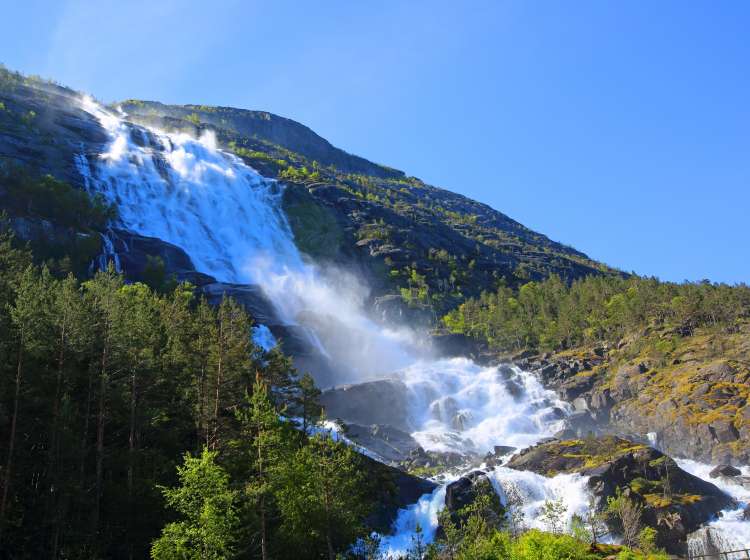 View on Langfossen Langfoss waterfall in summer, Etne, Norway