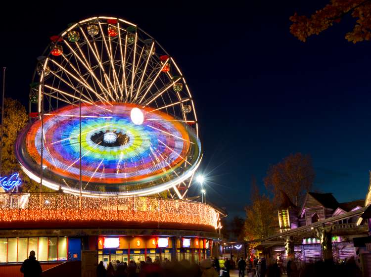Helsinki, Finland - October 17, 2013: Carnival of Light at Linnanmaki amusement park. Linnanmaki has entertained families since 1950.