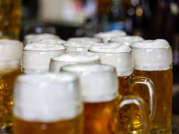 Steins of beer for sale in Germany. Photographer: Michaela Rehle/Bloomberg