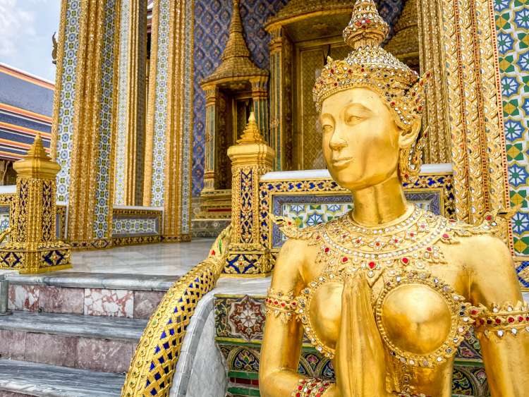 Bangkok, Thailand - April 30, 2020: Close up of Statues in the Grand Palace Bangkok Thailand. The Grand Palace is a complex of buildings at the heart of Bangkok, Thailand. The palace has been the official residence of the Kings of Siam since 1782. Top tourist attraction for any visiting the capital.