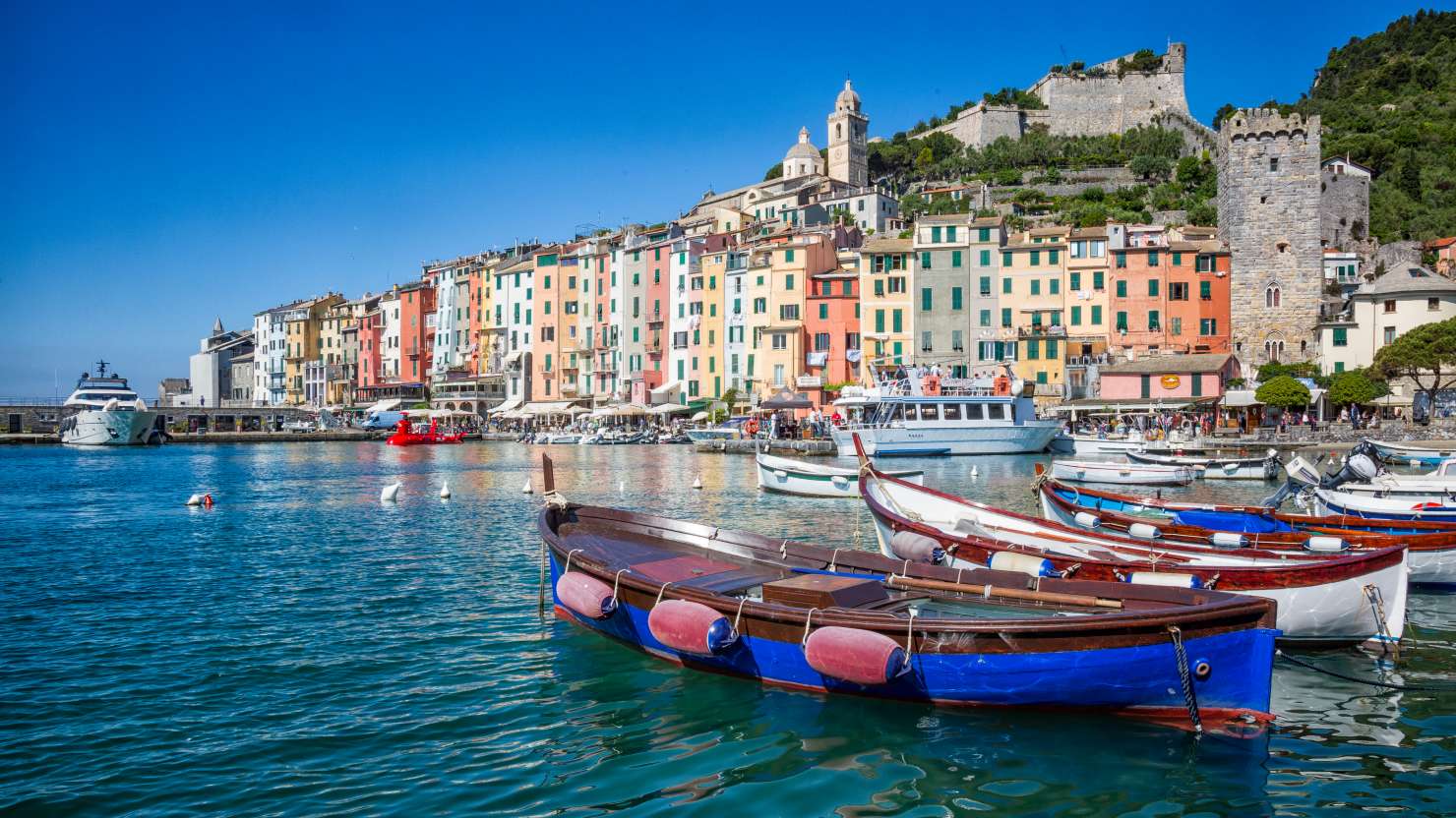 Pretty Porto Venere with medieval castles and pastel-painted houses and wooden boats are picture perfect for the Ligurian Coast