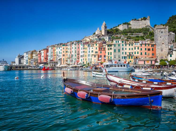 Pretty Porto Venere with medieval castles and pastel-painted houses and wooden boats are picture perfect for the Ligurian Coast