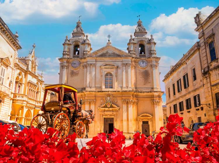 Wide view of Saint Paul Cathedral architecture in Mdina village of Malta on a sunny day in Europe