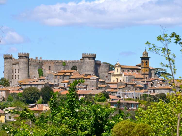 Medieval Castle dominating the town of Bracciano in central Italy; Shutterstock ID 1006097350; Invoice Number: -