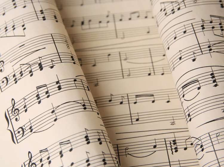 Closeup view of sheets with music notes