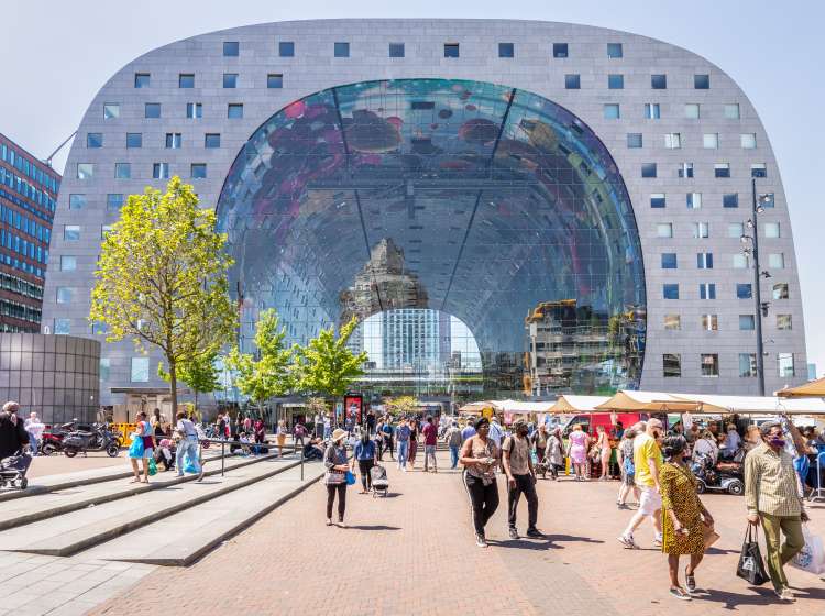 Rotterdam, Netherlands, June 1, 2021; Modern residential and retail building with indoor market hall in the center of Rotterdam.