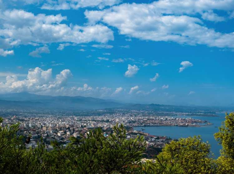 Crete island, panoramic above view of Chania Old Town, Greece. Traditional historic city, view of Akrotiri from park with pine tree and Venizelos tomb.