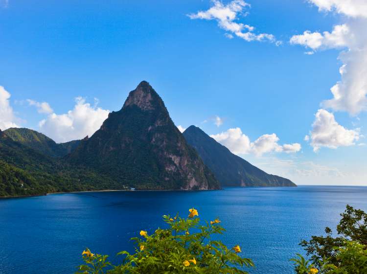 The Pitons are undoubtedly the best known natural landmark of Saint Lucia. These two twin volcanic plugs, the Gros Piton and Petit Piton, 770 and 743 meters high, respectively, are included in UNESCO World Heritage Site since 2004. They are just south of the town of Soufriere. Canon EOS 5D Mark II