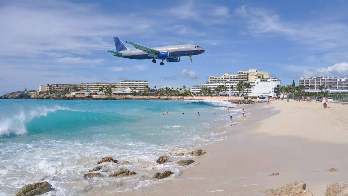  Airplane Landing above Maho Beach in St. Maarten Island; Shutterstock ID 736251334