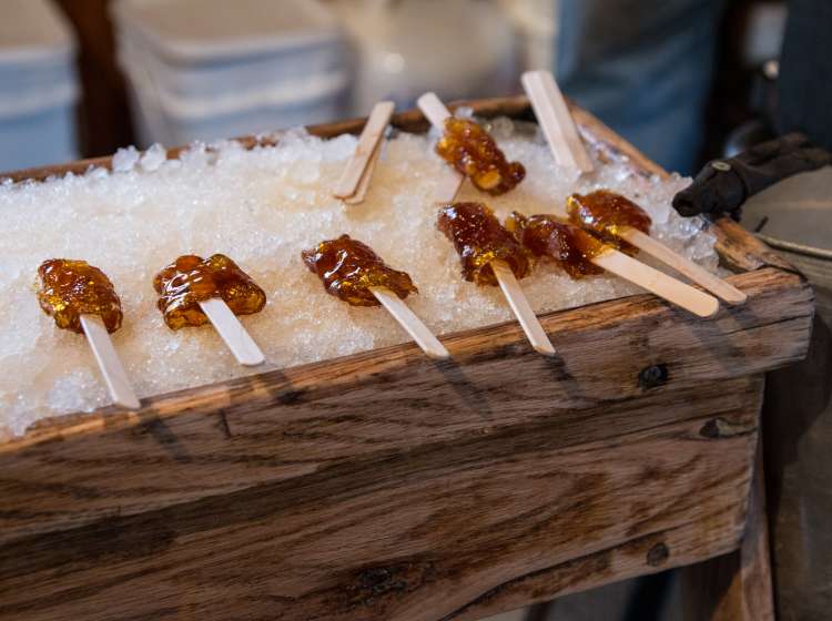 Maple taffy on snow at the sugar shack; Shutterstock ID 612899654; Purchase Order: -