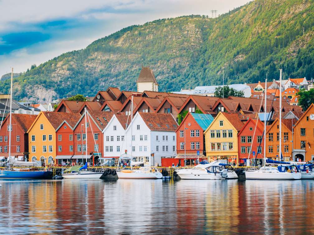  Boats on water infront of houses 