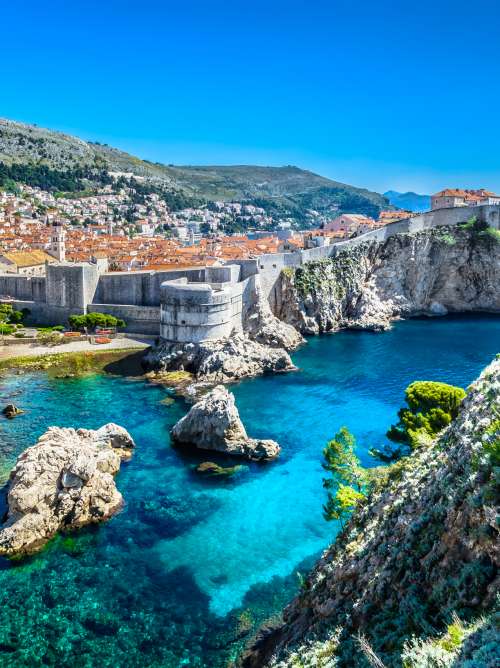 Mountain view of sea and buildings