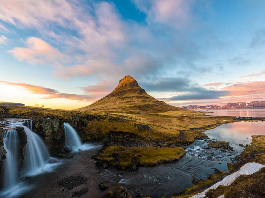 Evening long exposure shot at Kirkjufell, Grundarfjordur town, West Iceland with the moving cloud over the mountain ; Shutterstock ID 615889553; Invoice Number: -