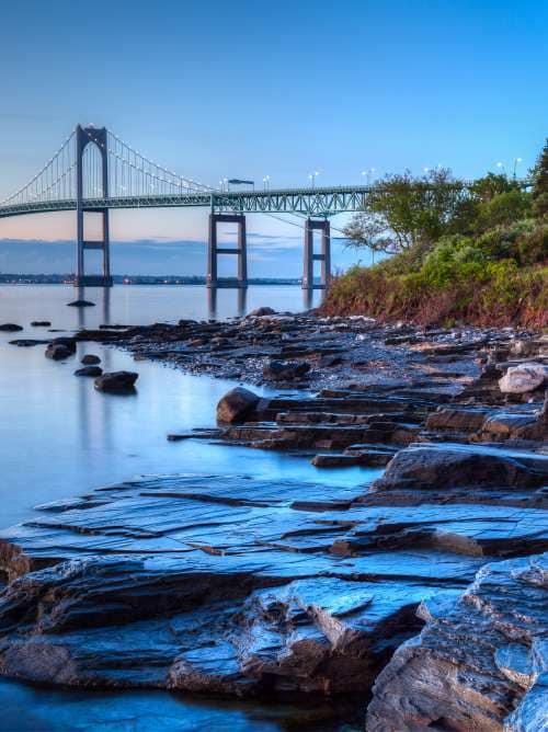  A bridge over water with an evening sky