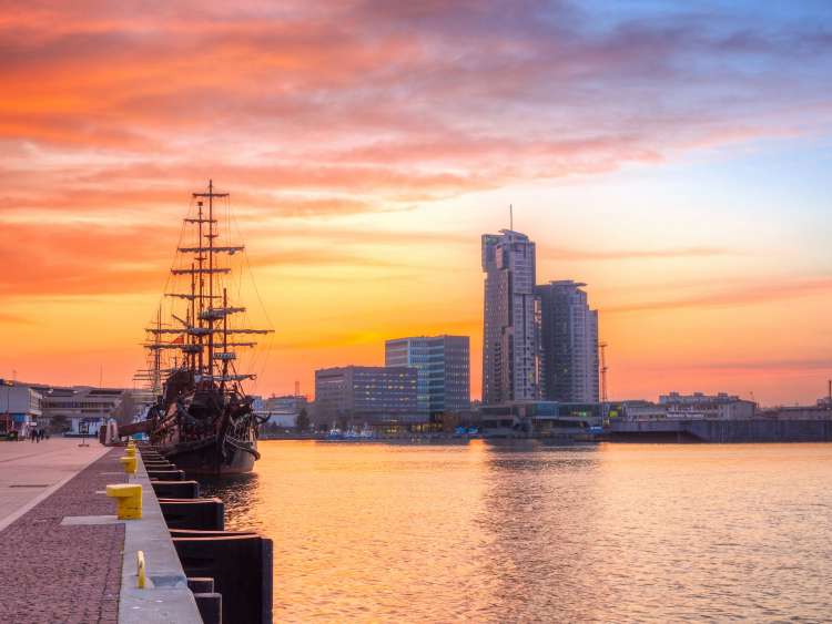 Pirate ship docked in Gdynia city in Poland at sunset