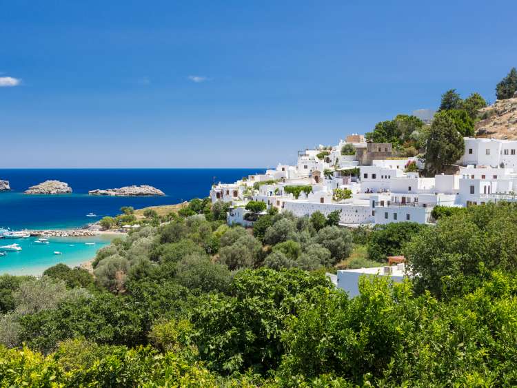 Coastline and white house in Rhodes, Greece