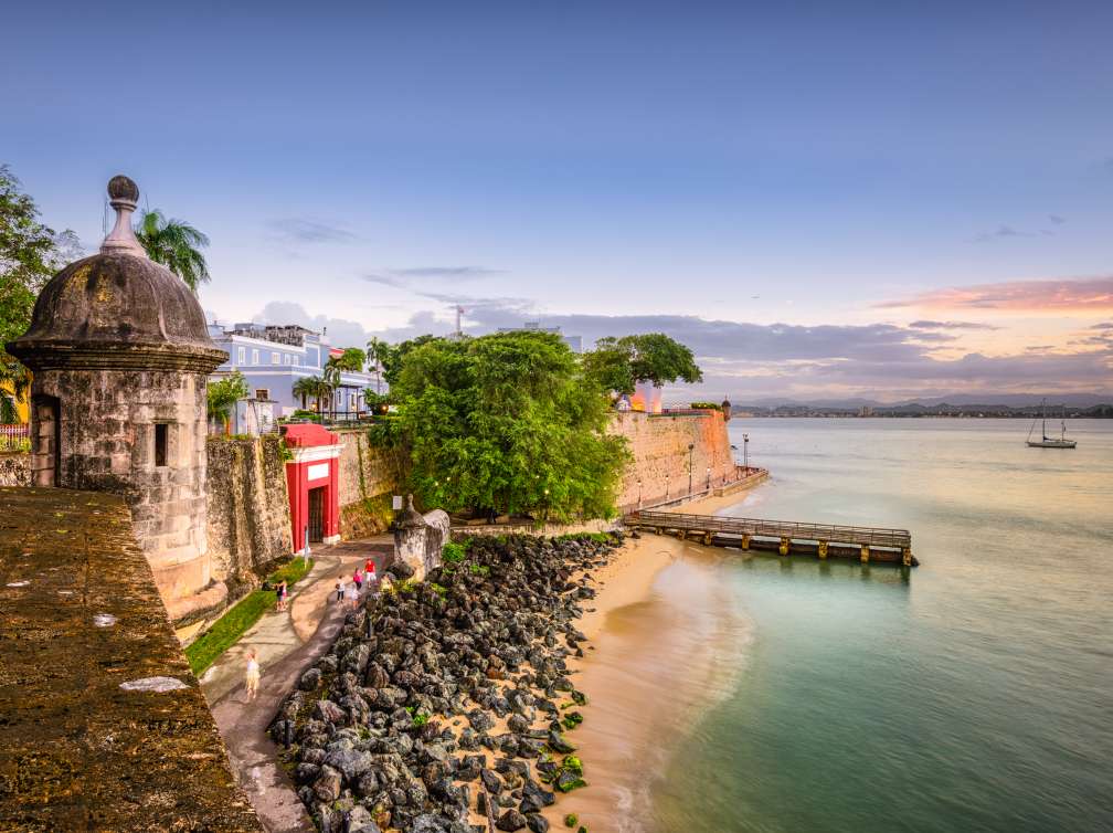 Little pier and castle by sea
