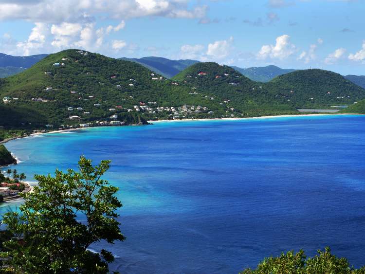 Views of houses in mountains by the sea