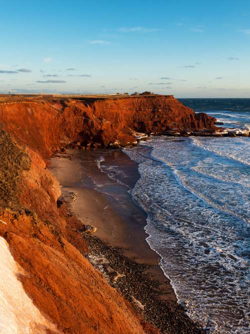  A red cliff next to the sea