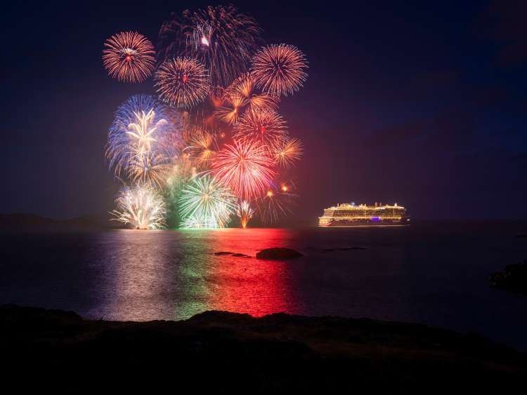 Immediate release: Monday August 9, 2021 - Editorial free to use image.
Fireworks celebrate maiden voyage of P&O Cruises Iona to namesake island
Britains largest and most environmentally-friendly cruise ship, P&O Cruises Iona, has embarked on its maiden voyage visiting its Scottish namesake island with a fireworks display as the highlight of celebrations.
P&O Cruises President Paul Ludlow said: 
Ionas maiden voyage is the start of a new era in travel as Britains most environmentally-friendly cruise ship, the first in the country powered by liquefied natural gas, sets sail.
For this special maiden voyage we wanted to bring guests to the island of Iona which has influenced many aspects of the ship  the sense of space in the SkyDome through to our gin still named Columba, the heather in our Marabelle gin distilled on board and, of course, the name of the ship.
Ionas first-ever cruise is currently sailing around the UK coast, for seven nights, having departed P&O Cruises home port of Southampton on August 7, 2021.
The ship is at anchor adjacent to the island of Iona ahead of commencing scenic cruising around the Isle of Colonsay, Lochbuie, Duart Castle, Tobermory, Bac Mòr, Fingals Cave, Sound of Jura, Claggain Bay, Mull of Kintyre and Sanda Island.
Iona also features the first gin still on a cruise ship, created in association with Salcombe Gin, distilling tailor made spirit on board. The gins maiden production will take place in Ionas custom-made still and will be distilled, bottled and labelled on board.
Gary Barlow is music director of Ionas 710 Club. This atmospheric late-night music venue will offer an opportunity for up-and-coming musicians to get their break.
Spectacular aerial shows have also been especially devised for Iona, the brainchild of Canadian entertainment company Creativiva. The ships stunning design, featuring a two-deck glass SkyDome, has been the inspiration for one of the shows, Rise, created