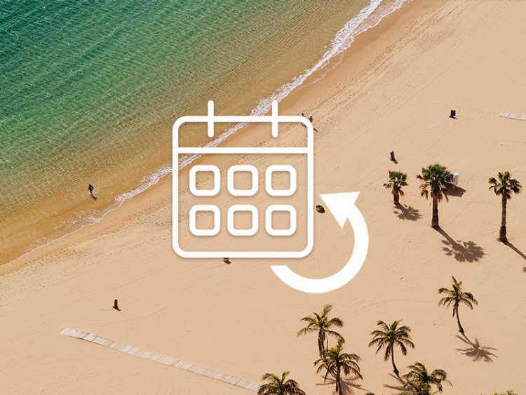 Transferring on calendar with the background of a sandy beach