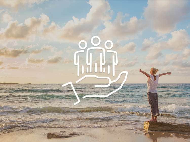 Person enjoying sunshine at the beach 