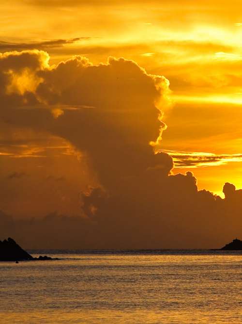 Sunset over mountains and sea in St Lucia