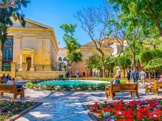 VALLETTA, MALTA, MAY 2, 2017: People are enjoying shade in the upper barrakka gardens in Valletta, Malta
