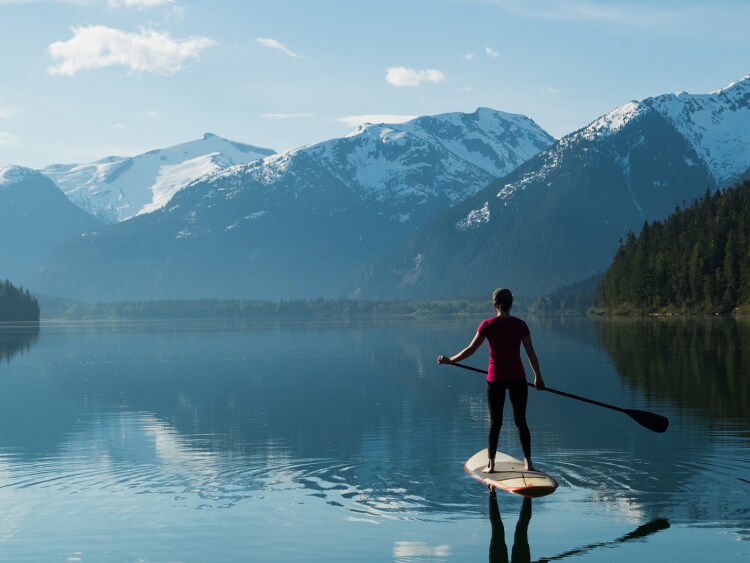 Paddleboarding in a lake in Canada