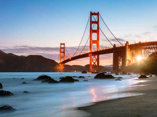 Dawn at the Golden gate bridge from Baker beach, San Francisco, California, USA