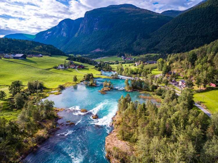 River Oldeelva surrounded by mountains in Olden, Norway