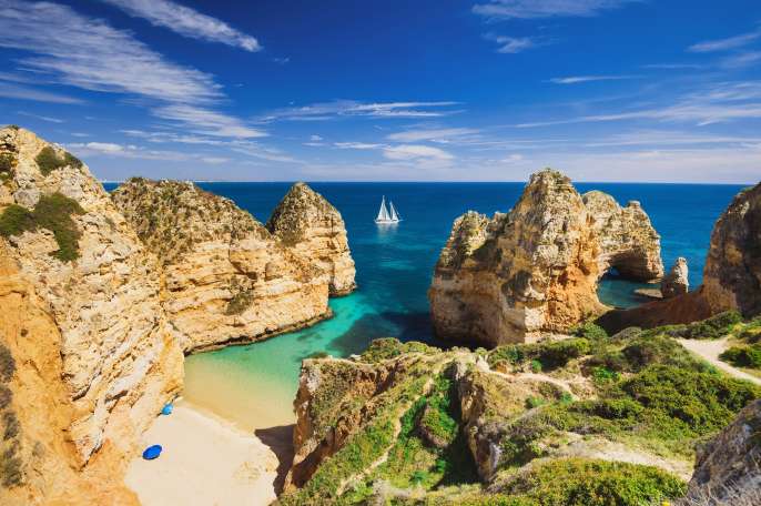 Beautiful bay near Lagos town, Algarve region, Portugal. Sandy beach. Portuguese landmark, popular travel destination; Shutterstock ID 721857286; project: olly; job: ; client: pocruises; other: 