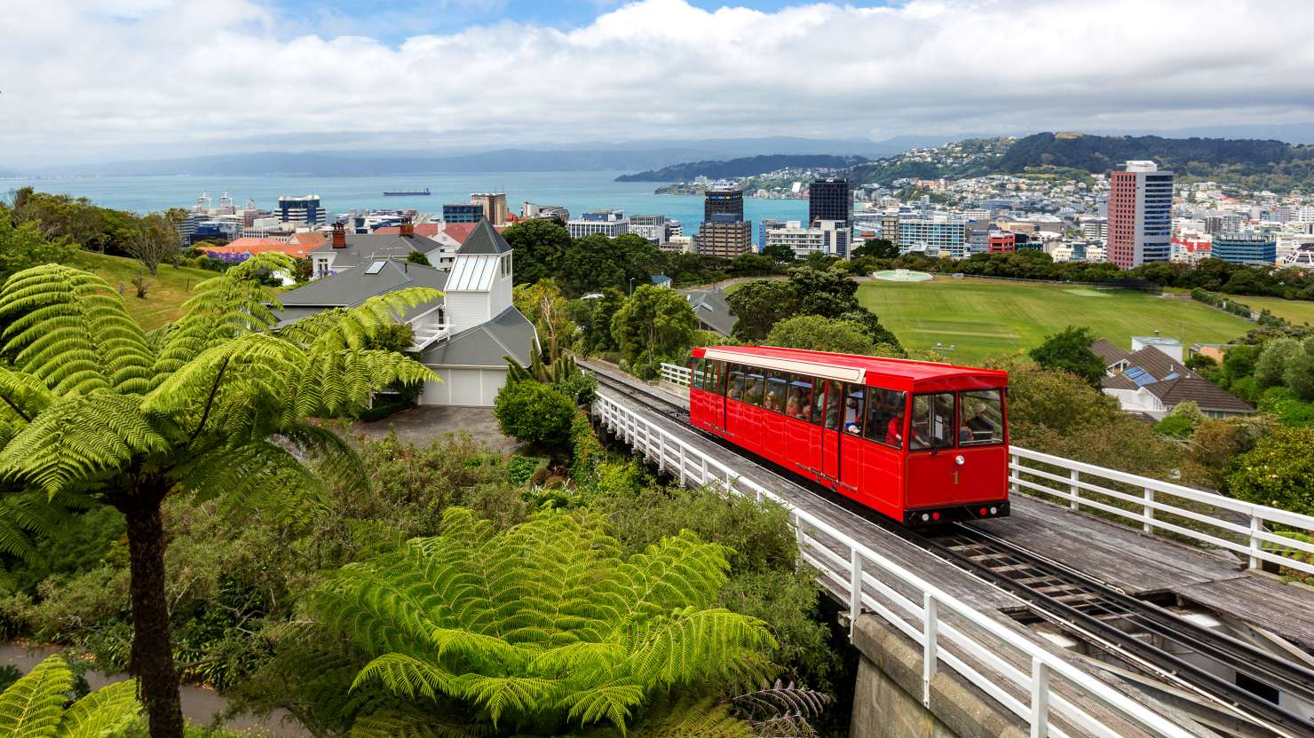 View of Wellington City and Cable Car, North Island, New Zealand.
Wellington is the capital city of New Zealand, located at the south-western tip of the North Island, between Cook Strait and the Remutaka Range. Wellington is the administrative centre of the Wellington Region, including the Kapiti Coast and Wairarapa. It is the second most populous urban area in New Zealand and is the world's windiest city.
