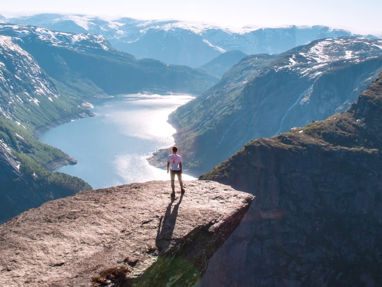 Man standing on Trolltunga, Norway