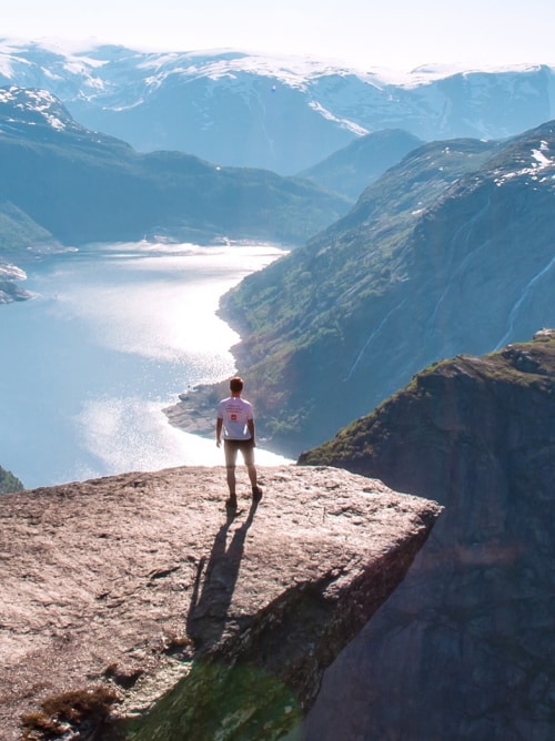 Man standing on Trolltunga, Norway