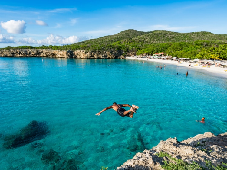 Man jumping into sea in the Caribbean