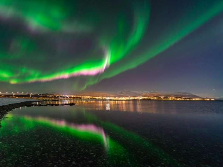 Vivid and active aurora on a full moon night.