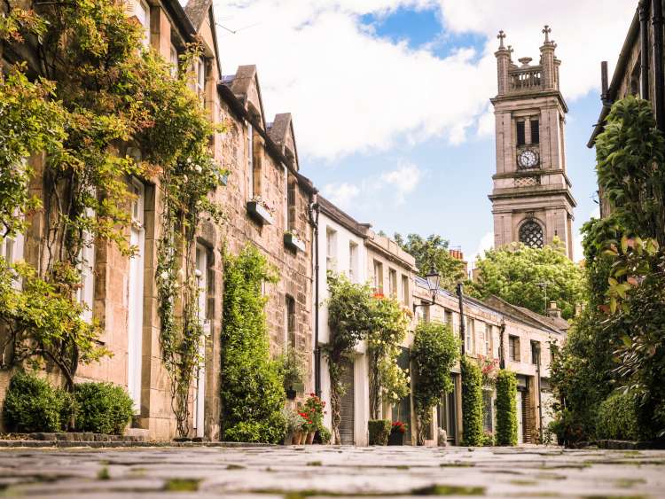 Circus Lane in Edinburgh's Stockbridge district, a quiet and historic residential cobbled street.