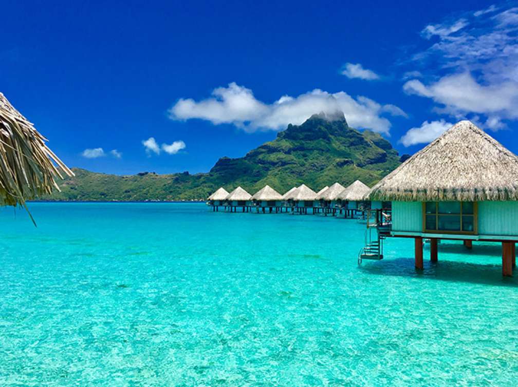 Overwater bungalows alongside French Polynesian islands