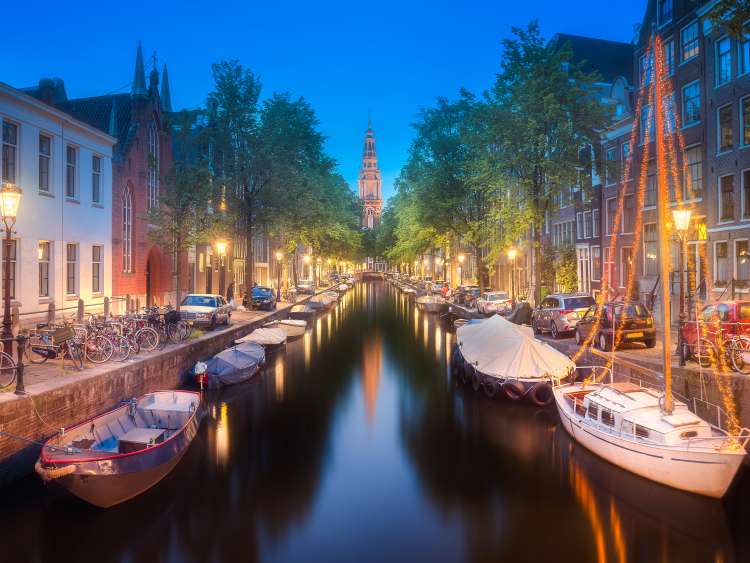 Groenburgwal Canal and Zuiderkerk Church clock tower, Amsterdam