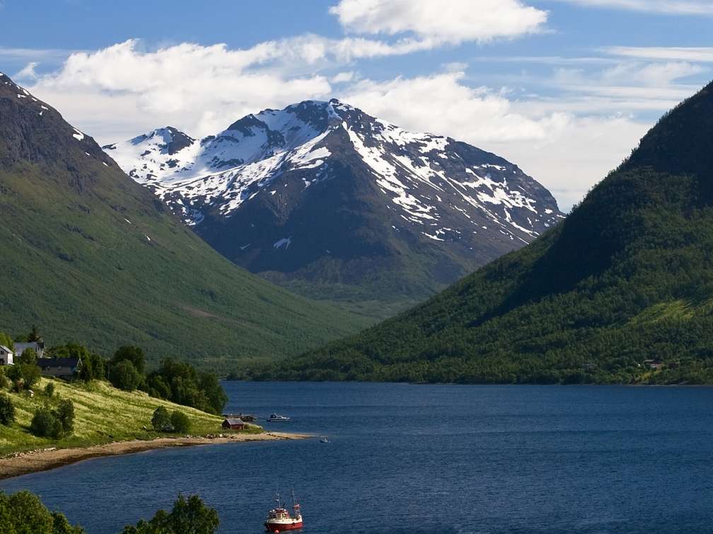 Snow topped mountains in the port of Tromso, Norway