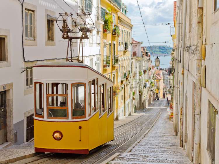 Lisbon's Gloria funicular classified as a national monument opened 1885 located on the west side of the Avenida da Liberdade connects  downtown with Bairro Alto.; Shutterstock ID 86309014; Client: P&O Cruises; Job: Winter itineraries toolkit; Licensee: Isabella
